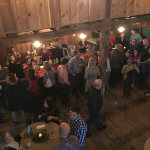 Wiggly Bridge Event aerial shot from the top floor of the barn, an image of the people conversing during a wiggly bridge event